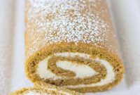 Warm Spiced Pumpkin Roll with Zesty Ginger Buttercream