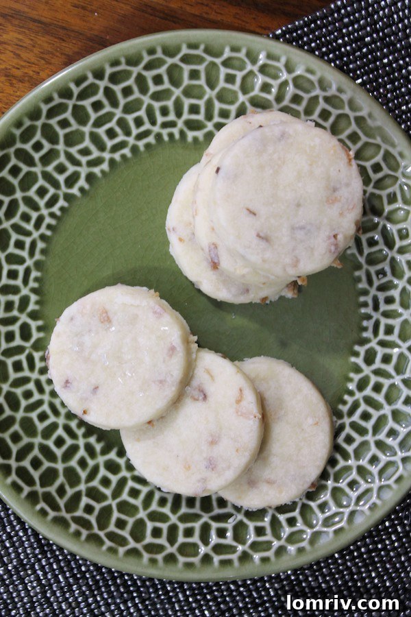 Close-up shot of Toasted Coconut Shortbread Cookies, showcasing their delicate texture and golden edges