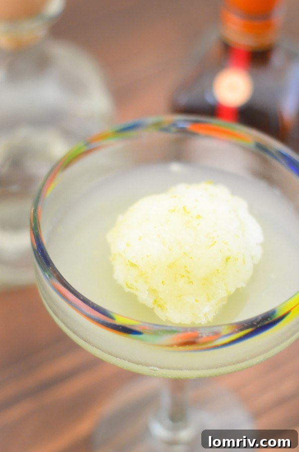 A refreshing margarita sorbet cocktail using lime sorbet