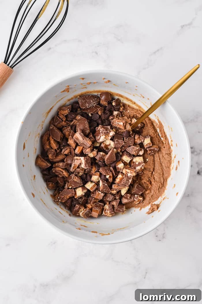 Overhead shot of two Chocolate Bar Cookie Bars on a cooling rack