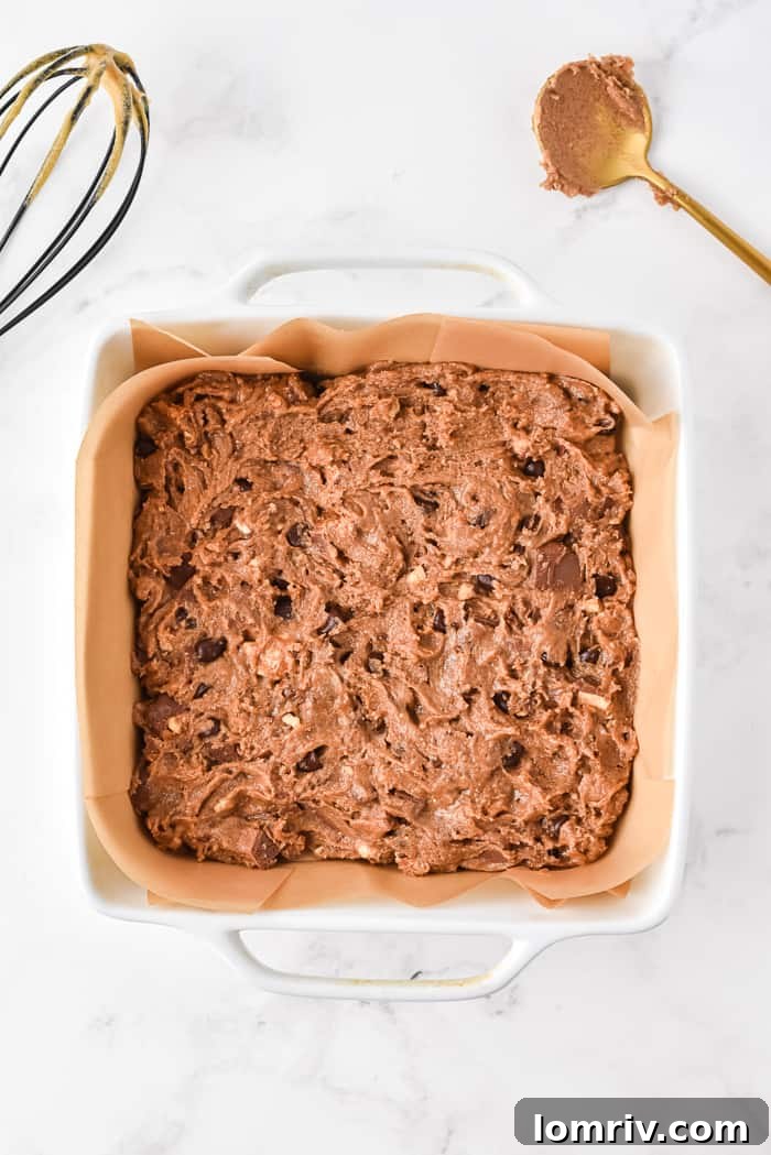 Chocolate Bar Cookie Bars fresh from the oven, still in the pan
