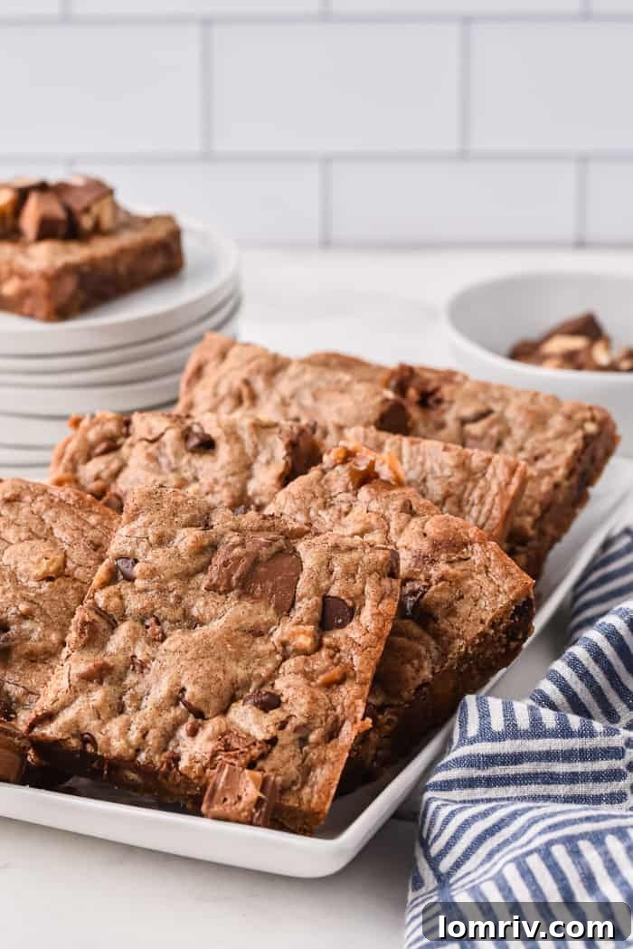 A Chocolate Bar Cookie Bar with a baby in the background, symbolizing ease for new parents