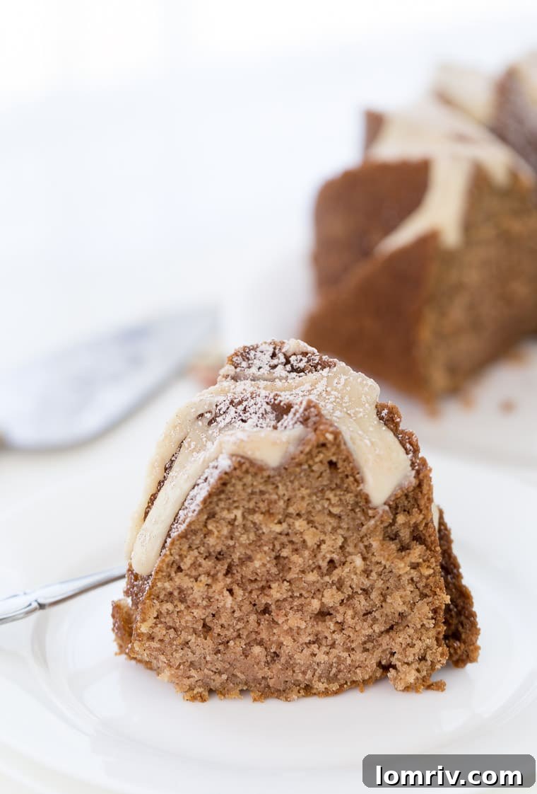 This applesauce cake with caramel glaze recipe is a moist, fluffy, light spiced cake that is topped with a sweet caramel glaze. 