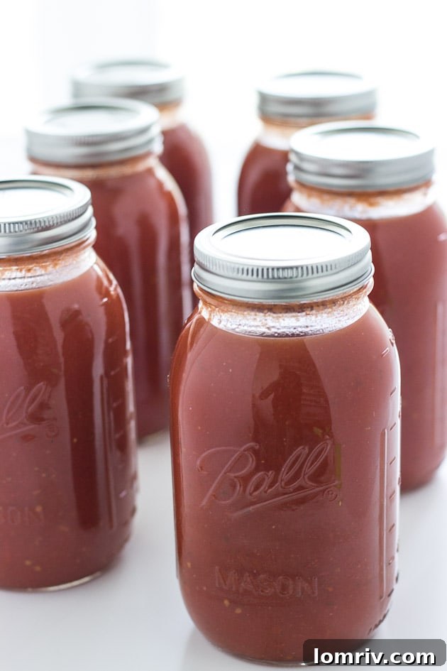 Jars of Canned Tomatoes, Ready for Winter