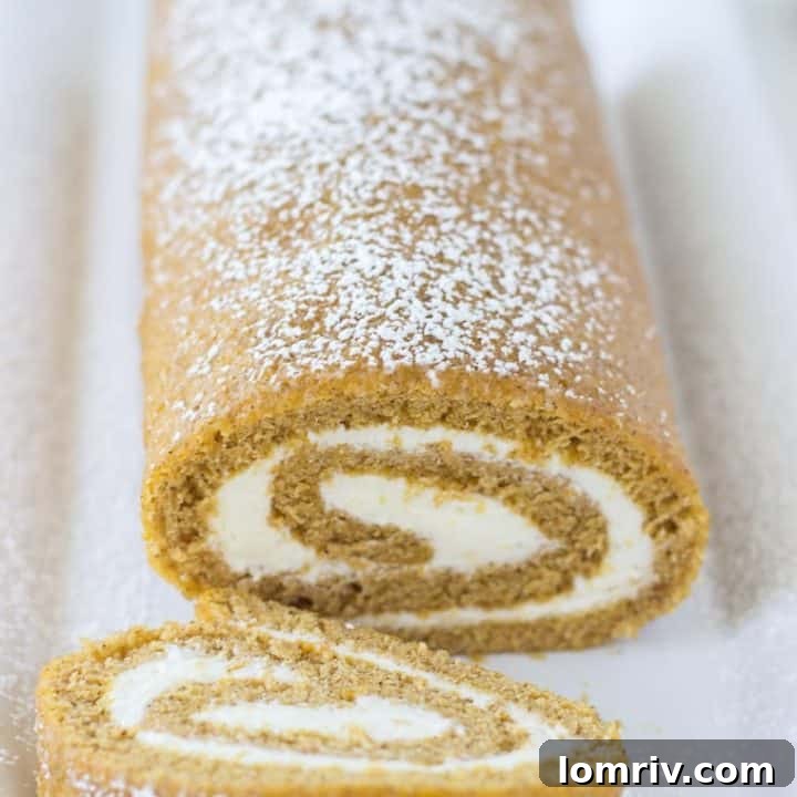Pumpkin Roll Cake with Ginger Cream Cheese Frosting