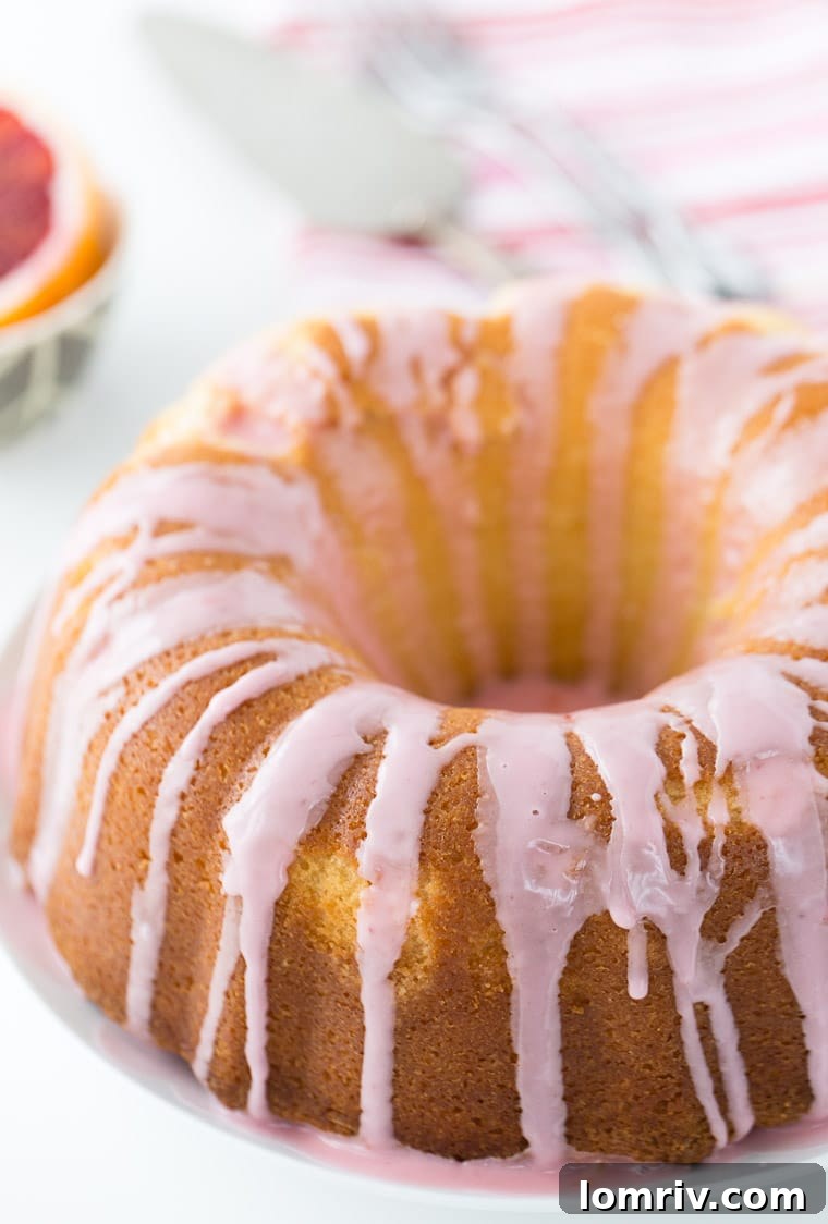 Stunning Blood Orange Mimosa Cake, a perfect blend of sweet blood orange and crisp pink Moscato for any celebration.