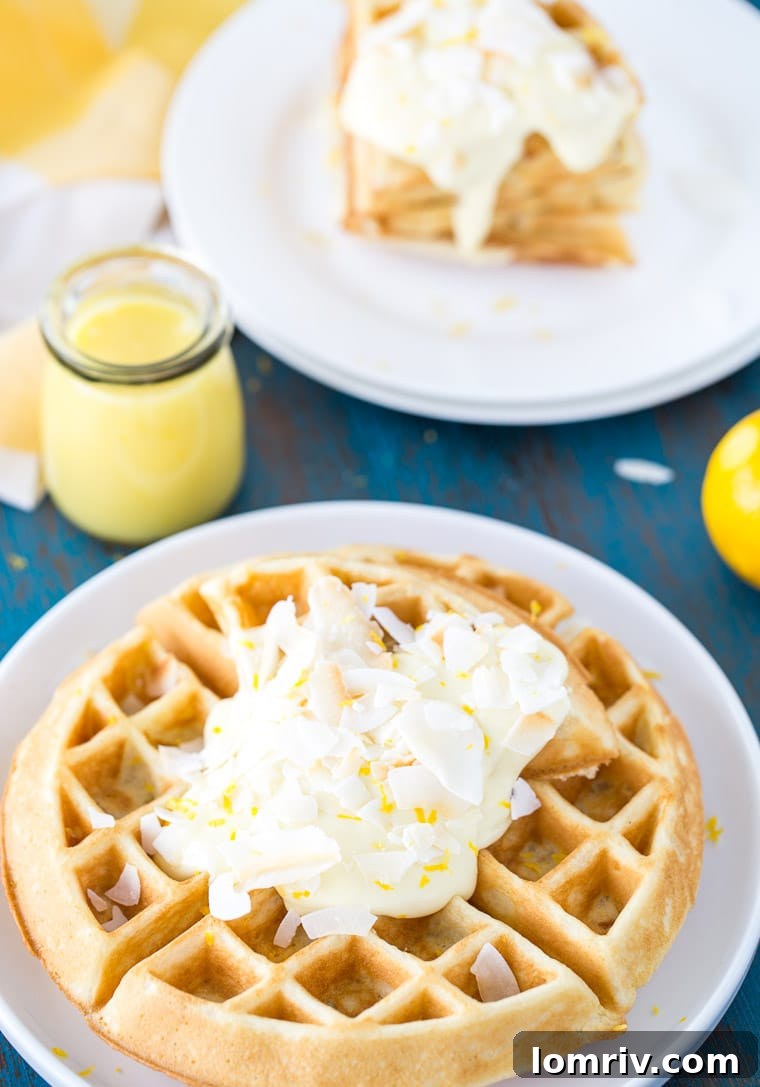 These coconut lemon creme waffles takes your ordinary waffle recipe to a new level with coconut and lemon zest in the waffles to a creamy lemon pie topping. 