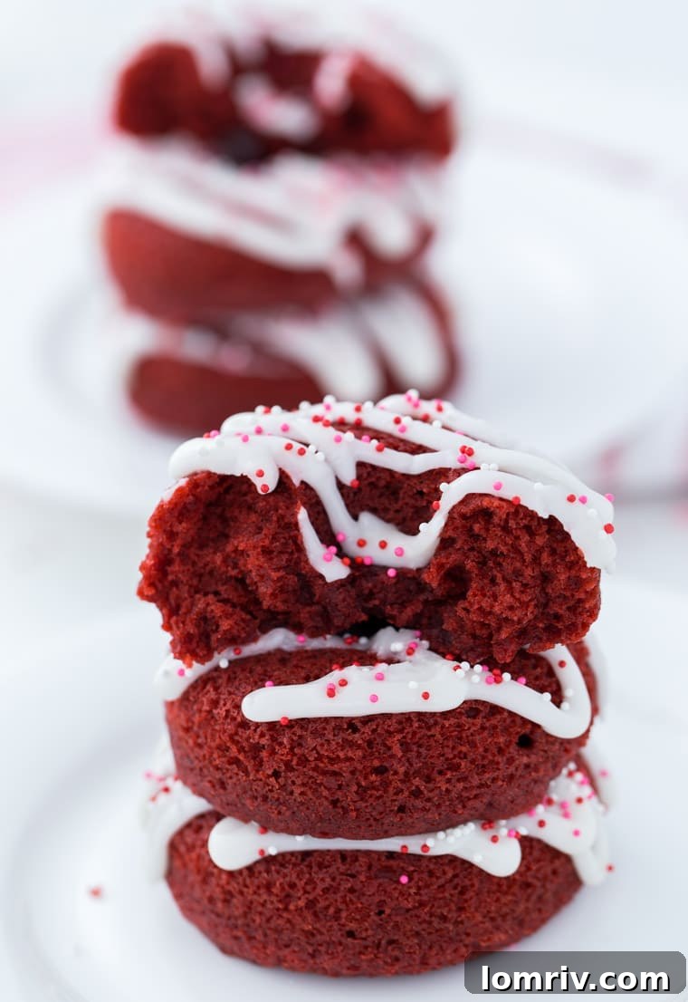 Close-up of a Red Velvet Donut, showing its rich color and sweet glaze