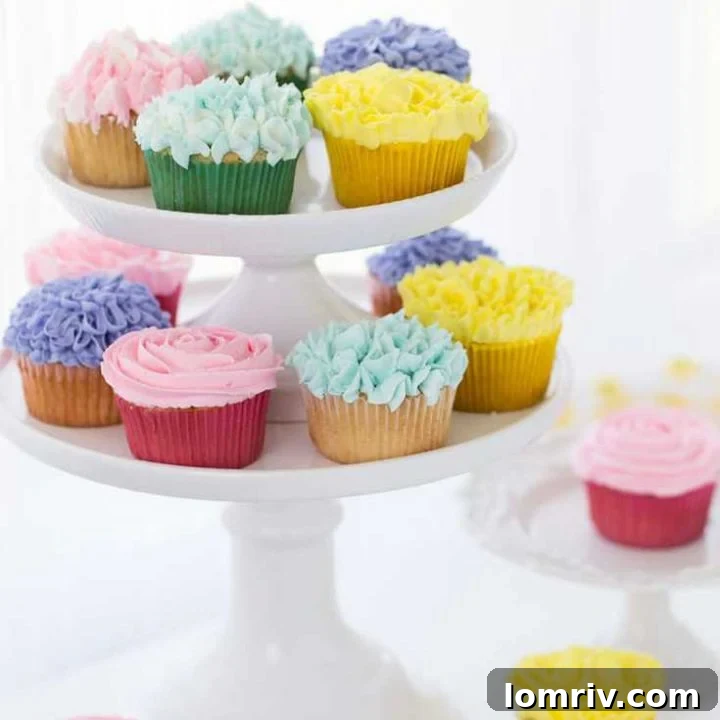 A tutorial on how to make flower cupcakes using vanilla buttercream and piping bags. These cupcakes are perfect for Spring and Mother's Day!