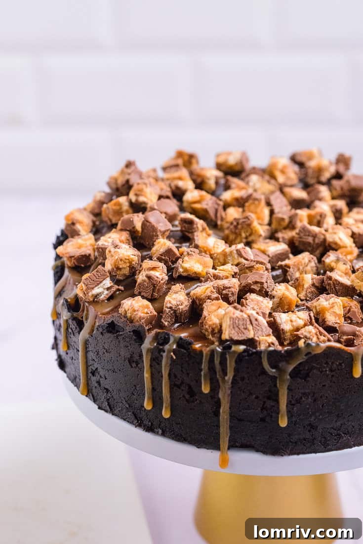 Baked Snickers Peanut Butter Cheesecake cooling