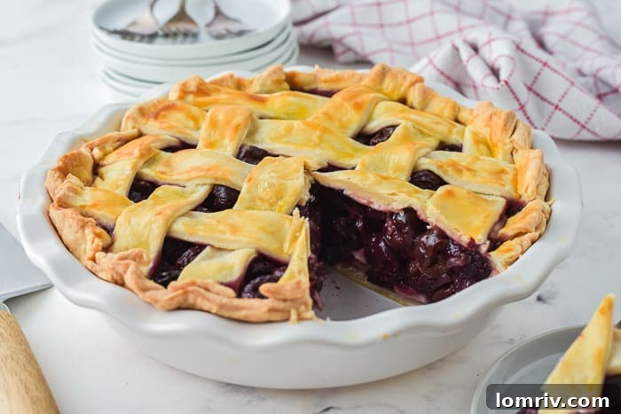 Close-up of freshly baked cherry pie cooling on a wire rack