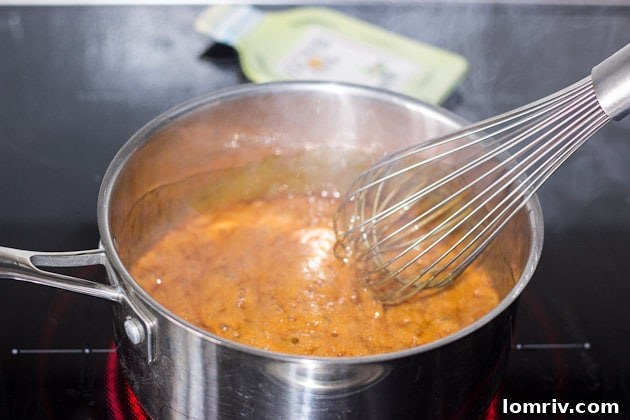 Adding heavy cream to caramel