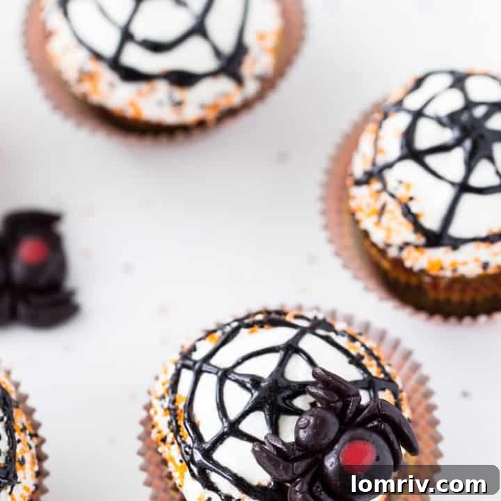 Spiderweb Cupcakes: Pumpkin Spice Cupcakes with Maple Cream Cheese Frosting