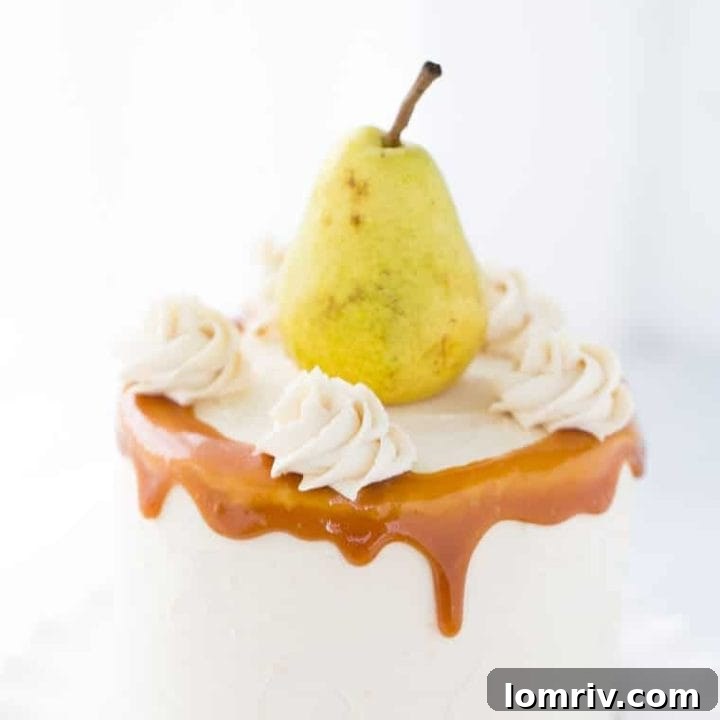 Beautifully frosted Spiced Pear Cake with Honey Caramel