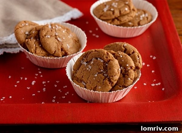 Classic Gingerbread Cookies decorated with white icing, a holiday baking essential