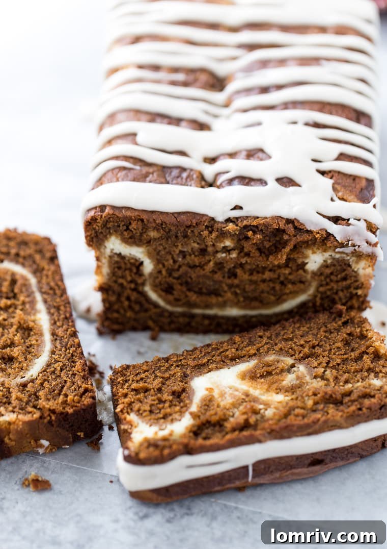 Close-up of a gingerbread latte cake slice, showing the beautiful cream cheese swirl and rich texture, highlighting the perfect spice and espresso infusion.