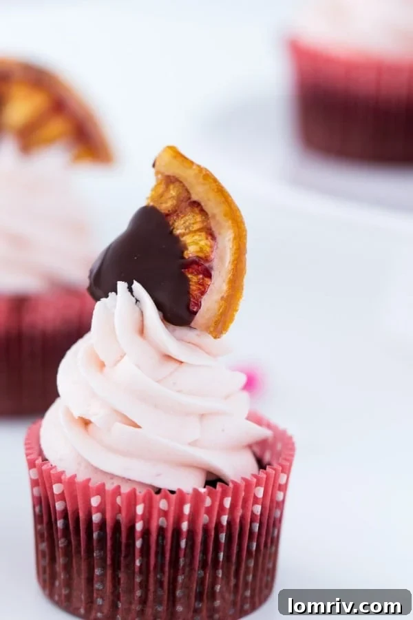 A classic chocolate cupcake recipe with sweet orange zest and blood orange buttercream. These Blood Orange Chocolate Cupcakes are a wonder!