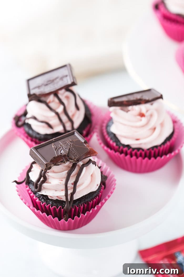A plate of Chocolate Strawberry Cupcakes, showing various angles of the decadent dessert