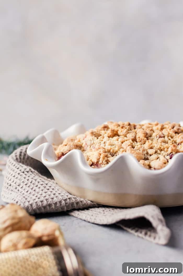 A beautiful holiday cranberry ginger pear pie with tender pears, tart cranberries and spicy ginger that warms you up on those cold winter days!
