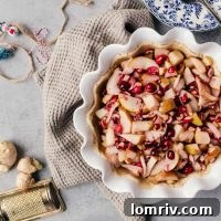 A beautiful holiday cranberry ginger pear pie with tender pears, tart cranberries and spicy ginger that warms you up on those cold winter days!