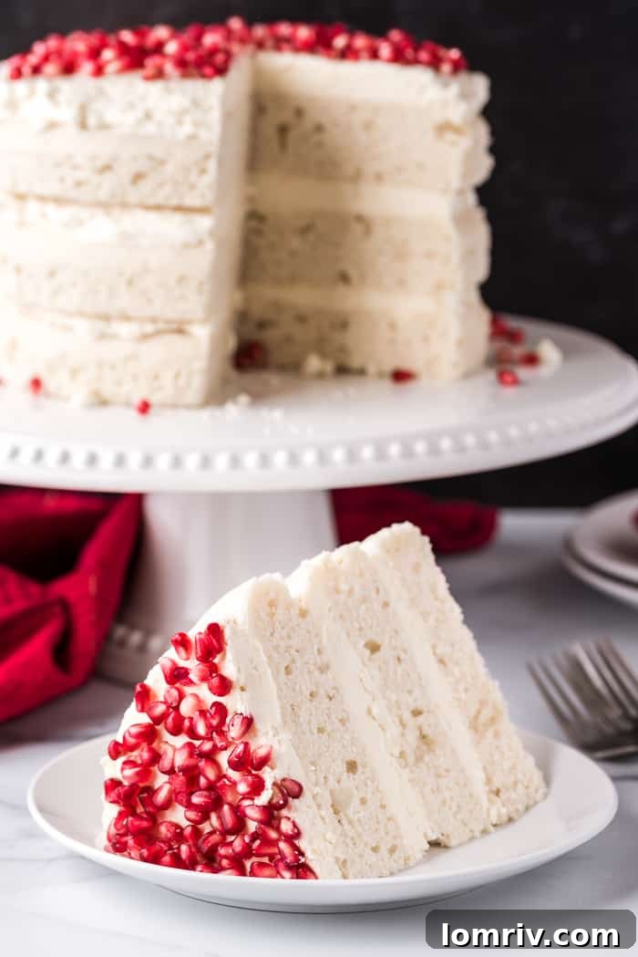 Elegant White Chocolate Pomegranate Vanilla Cake