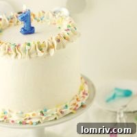 Cherry Vanilla Champagne Cake is perfect for your New year's Eve celebrations. Moist and fluffy cherry vanilla cake, filled with a sweet cherry champagne filling and topped with a creamy vanilla champagne buttercream! | Recipe on AClassicTwist.com