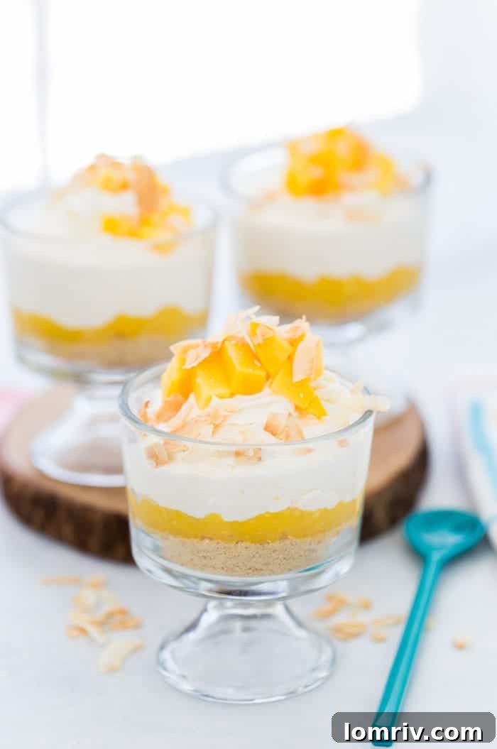 This tropical coconut mango mousse will transport you to the tropics with its creamy coconut base and sweet mango infusion, topped with fresh mango and toasted coconut flakes