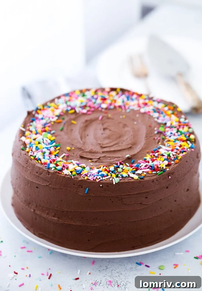 Super moist classic yellow cake with rich chocolate frosting, perfect for any celebration.