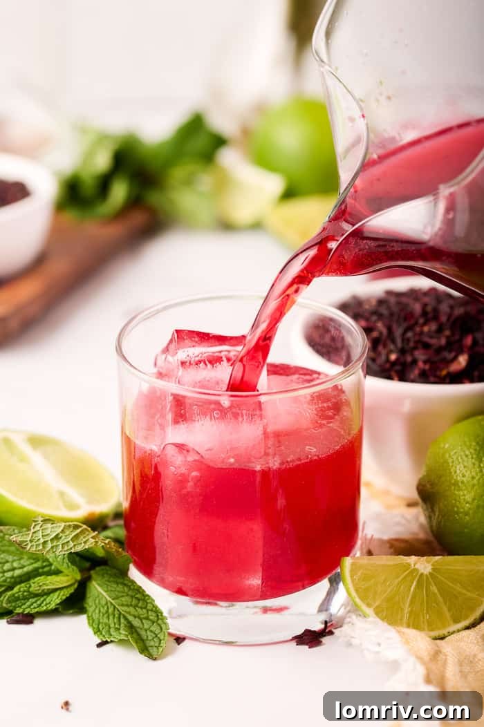 Serving Hibiscus Sparkler over Ice