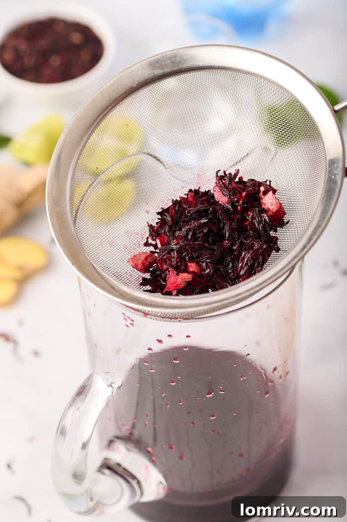 Straining Hibiscus Juice