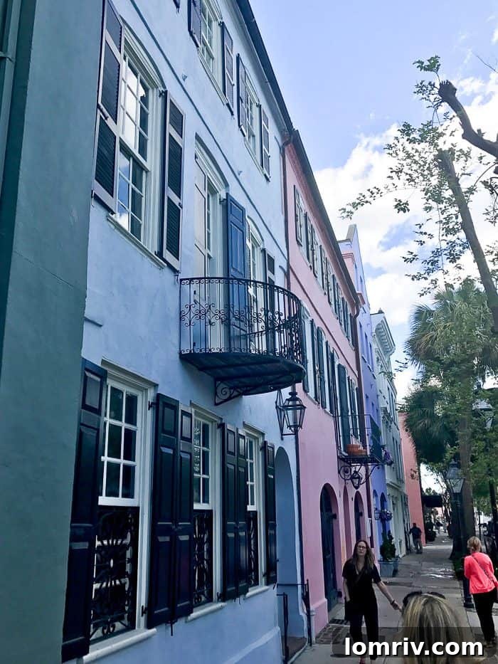 The iconic and beautifully colored houses of Rainbow Row in Charleston, a must-see historical landmark and photo opportunity.