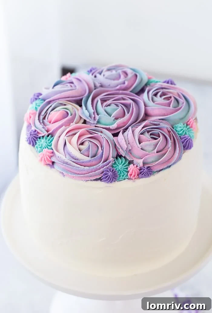 This white chocolate rose cake is an incredibly moist vanilla bean cake with hints of floral rose water and whipped white chocolate frosting, ideal for Mother's Day.