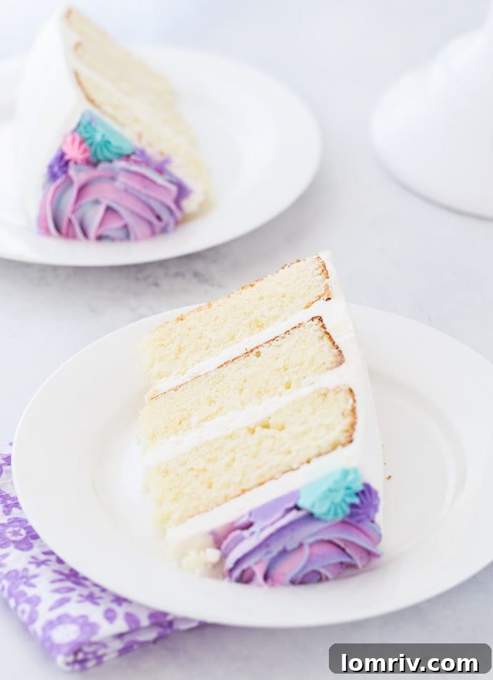Celebrate with this White Chocolate Rose Cake, featuring moist vanilla layers and a beautiful whipped white chocolate frosting, customizable for any event.