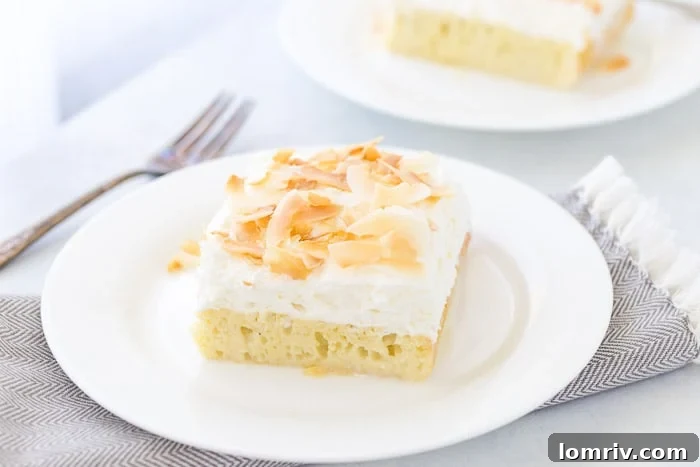 Coconut Tres Leches Cake: A moist sponge cake soaked in three coconut-infused milks, topped with fresh coconut whipped cream and dark rum.