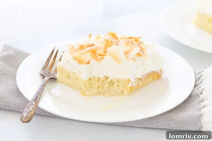 Coconut Tres Leches Cake: A moist sponge cake soaked in three coconut-infused milks, topped with fresh coconut whipped cream and dark rum.