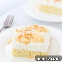 Coconut Tres Leches Cake: A moist sponge cake soaked in three coconut-infused milks, topped with fresh coconut whipped cream and dark rum.