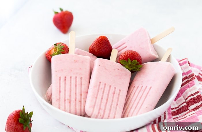 Strawberry Coconut Cheesecake Popsicles: A refreshing blend of sweet strawberries, creamy coconut, and tangy cheesecake.
