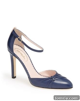 Stylish SJP high-heeled shoe in a vibrant color, exuding modern elegance.