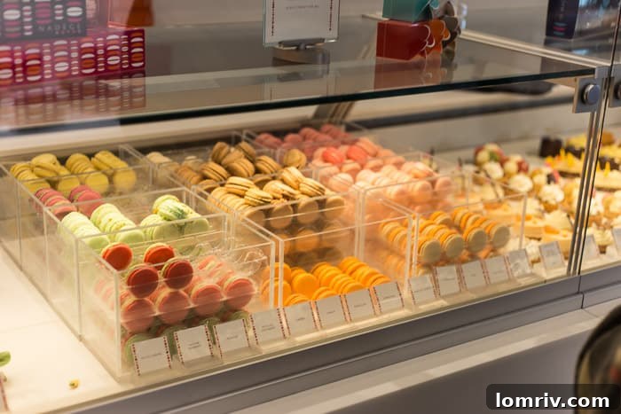 Another enticing view of Nadege Patisserie's macaron display, emphasizing the delicate textures and inviting colors that make them a Toronto favorite.