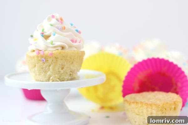 Close-up of fluffy vanilla bean frosting on a cupcake