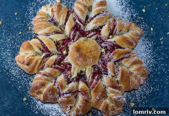 This Cranberry Cinnamon Star Bread is a holiday spectacular with a warm cranberry, brie and pistachio filling wrapped around a fluffy bread. 