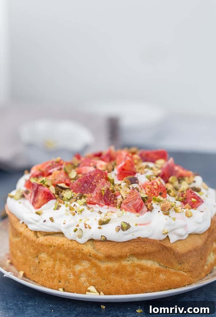 Rustic Orange Chiffon Cake with Vibrant Pistachio and Cardamom Swirls