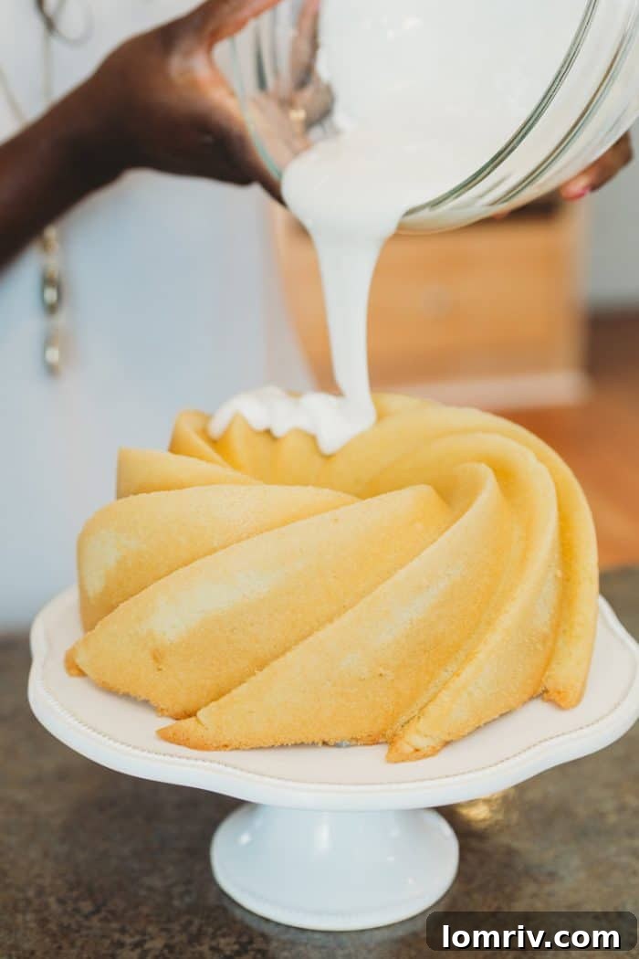 Slice of Coconut Lavender Bundt Cake showing its moist texture