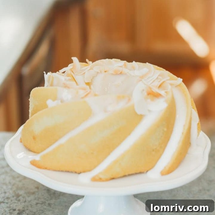 Coconut Lavender Bundt Cake with glaze and toasted coconut