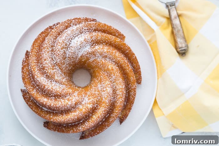 Close-up of a slice of moist Passion Fruit Bundt Cake.