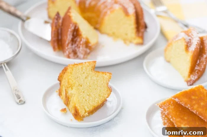 Close-up of a perfectly glazed Passion Fruit Bundt Cake slice.