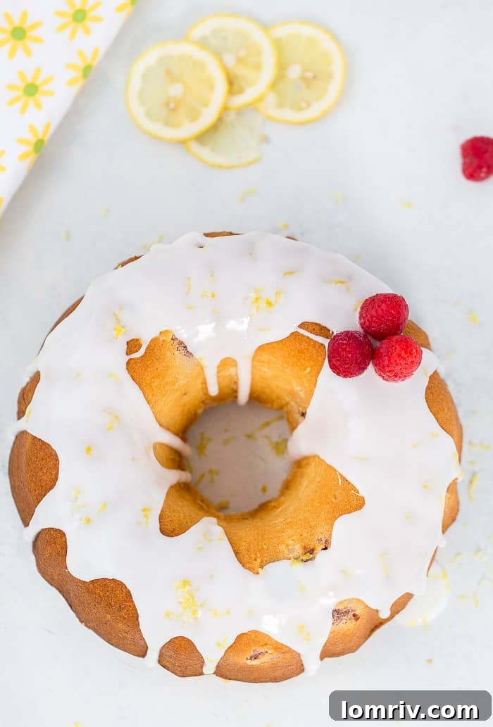 Moist Raspberry Lemonade Pound Cake sliced and ready to serve