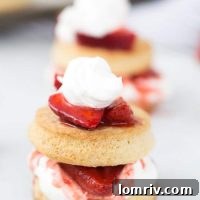 Delicious Strawberry Shortcake Stacked with Cream and Berries