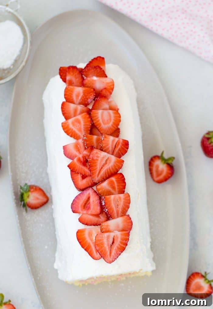 Preparing the strawberry roll cake with fresh ingredients