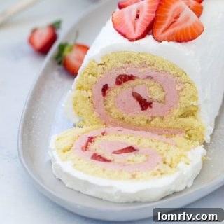 strawberry roll cake with fresh berries